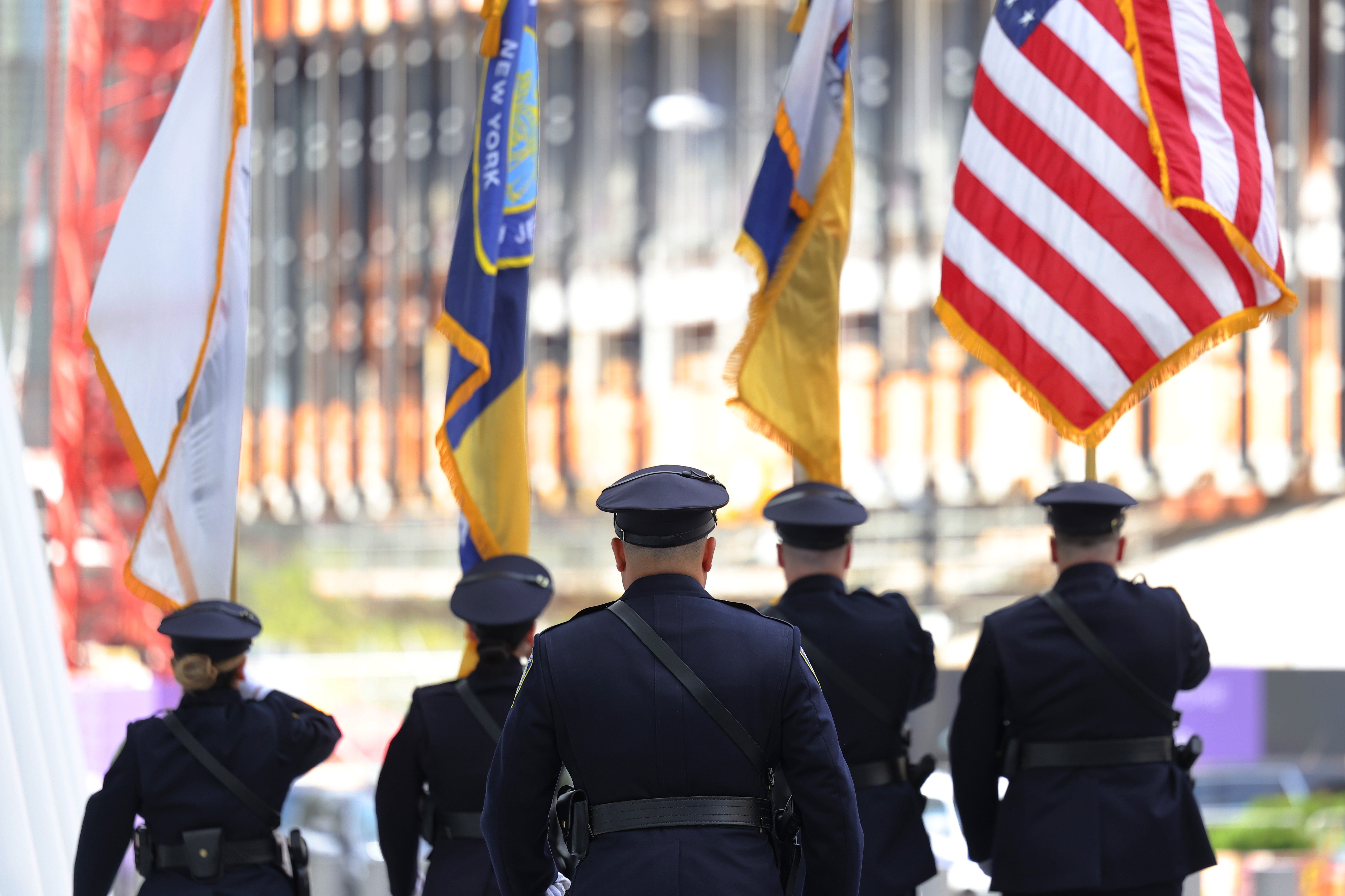 NEW YORK, NEW YORK - SEPTEMBER 11: Port Authority Police Color Guard march during a Port Authority Interfaith Remembrance Service on the 20th anniversary of September 11th at the North Oculus Plaza on September 11, 2021 in New York City. Port Authority held its annual remembrance service in honor of the 84 members of the agency including 37 members of the Port Authority Police who were killed during the terror attacks on the World Trade Center. The ceremony also honored those who perished in the 1993 WTC bombing. The nation is marking the 20th anniversary of the terror attacks of September 11, 2001, when the terrorist group al-Qaeda flew hijacked airplanes into the World Trade Center, Shanksville, PA and the Pentagon, killing nearly 3,000 people. (Photo by Michael M. Santiago/Getty Images)