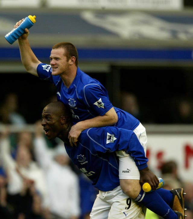 A 16-year-old Wayne Rooney (top) celebrates his late winner in Everton’s 2-1 victory over Arsenal in 2002 (Nick Potts/PA).