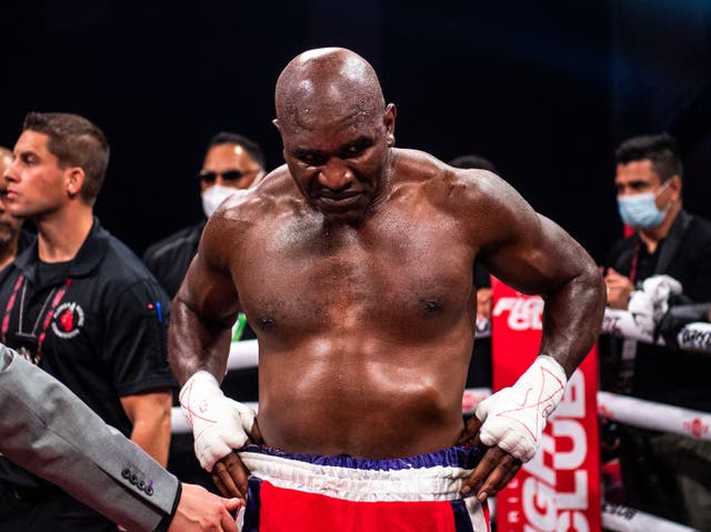 <p>Evander Holyfield after losing via first-round stoppage against Vitor Belfort</p>