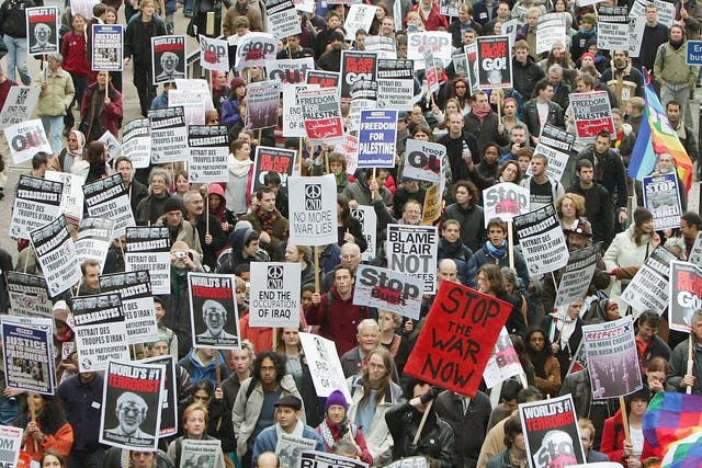 <p>Protesters take part in an anti-war rally in London</p>