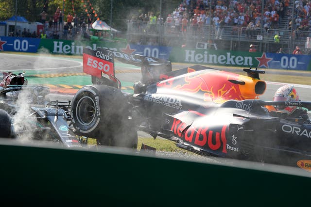 Red Bull driver Max Verstappen, right and Mercedes driver Lewis Hamilton crashed out at Monza (Luca Bruno/AP)
