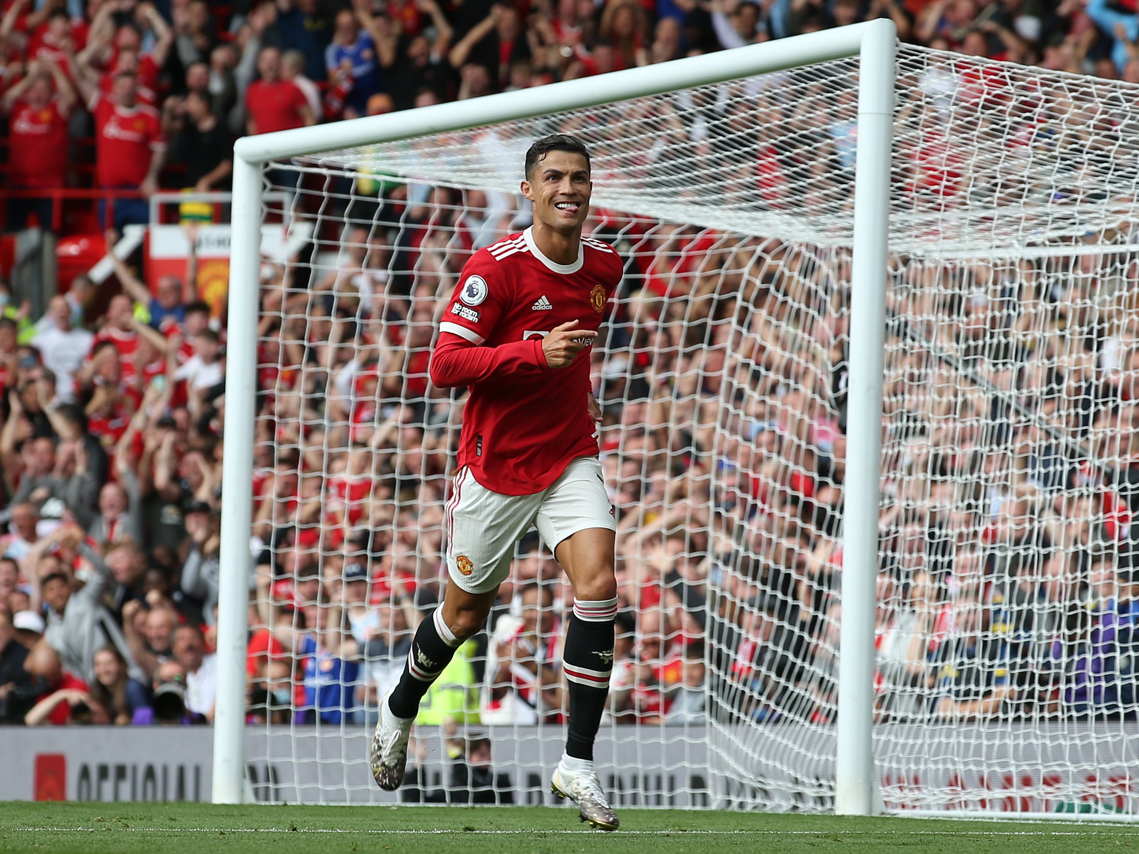 Cristiano Ronaldo celebrates scoring on his Manchester United return