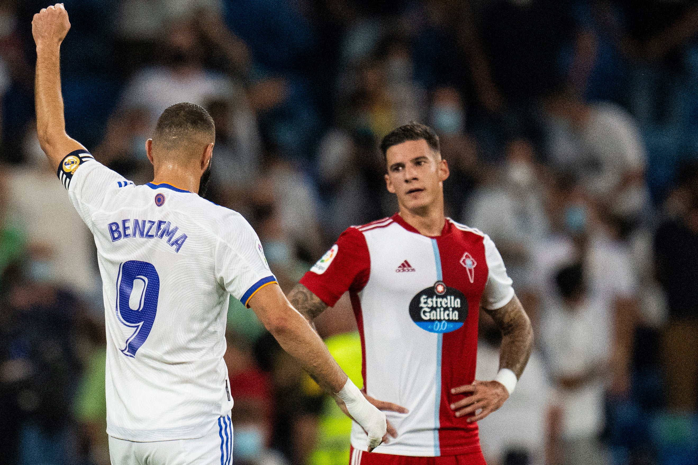 Karim Benzema, left, scored a hat-trick to sink Celta Vigo (Manu Fernandez/AP)