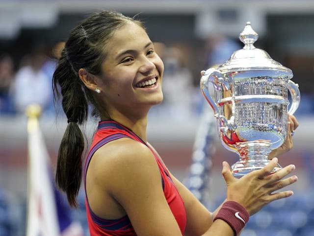 Great Britain’s Emma Raducanu holds the trophy as she celebrates winning the US Open women’s singles final (ZUMA/PA)