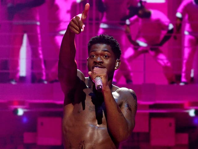 <p>Lil Nas X onstage at the 2021 MTV VMAs</p>