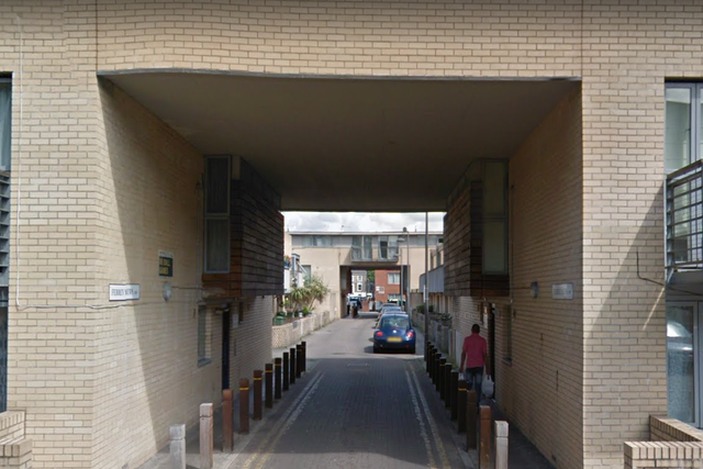 <p>The two victims of the shooting were found by paramedics in this street in Brixton, south London</p>