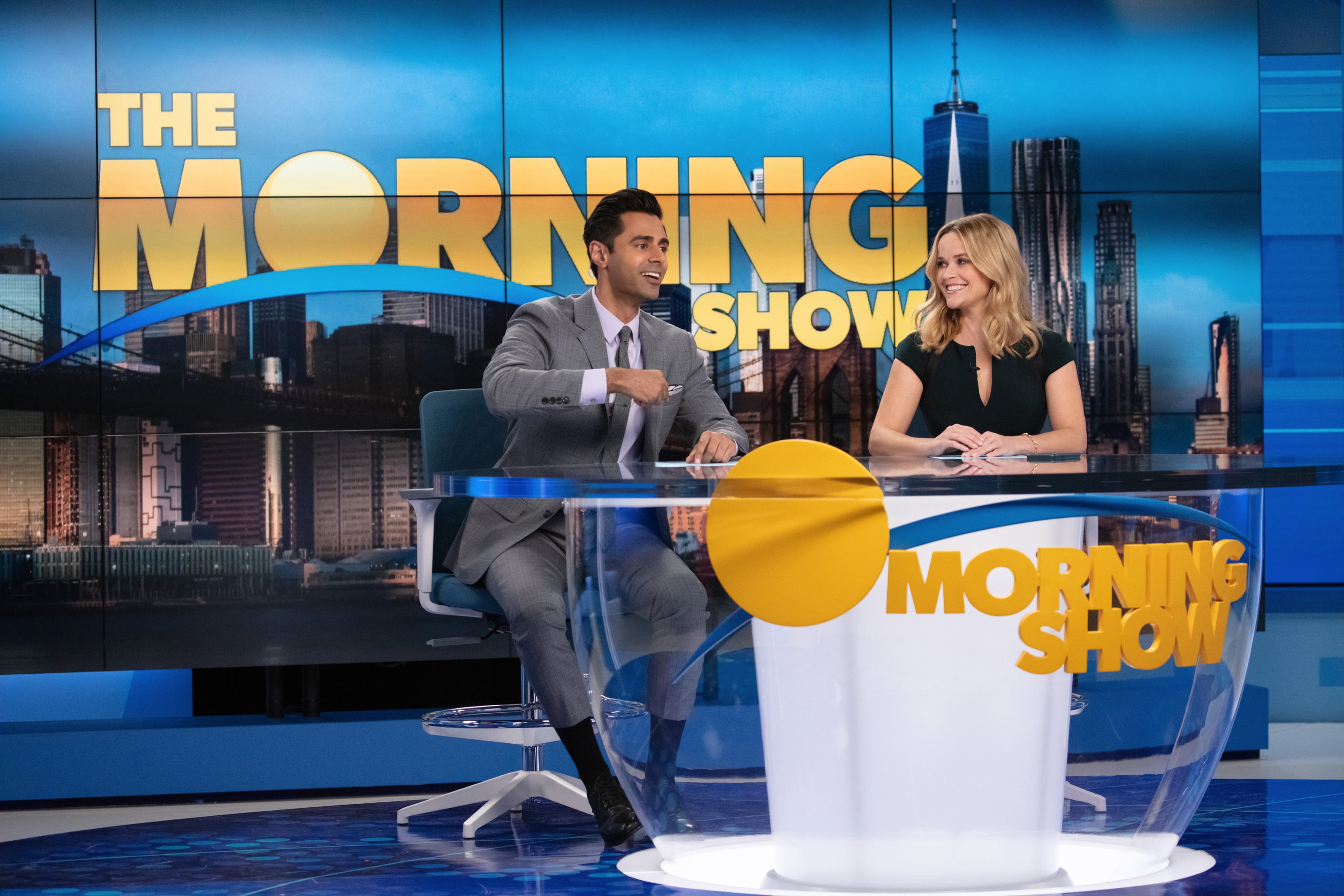 Undated Handout Photo from The Morning Show. Pictured: Hasan Minhaj as Eric, Reese Witherspoon as Bradley Jackson. See PA Feature SHOWBIZ TV The Morning Show. Picture credit should read: PA Photo/Courtesy of Apple TV+. WARNING: This picture must only be used to accompany PA Feature SHOWBIZ TV The Morning Show.