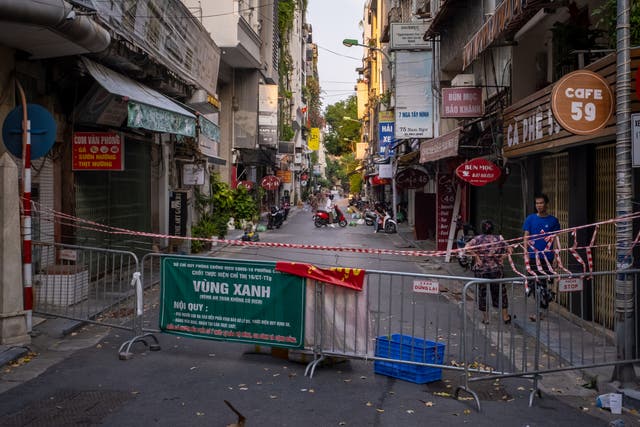 <p>Lockdown restrictions on movement have been imposed across Vietnam as the country grapples with a fresh spike in Covid cases</p>