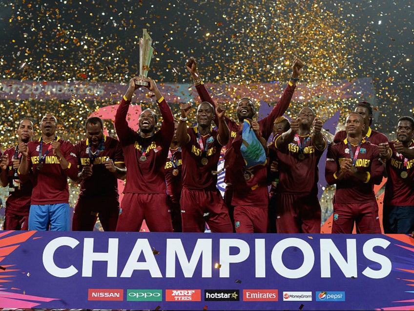 <p> The West Indies lift the ICC World T20 trophy in 2016</p>
