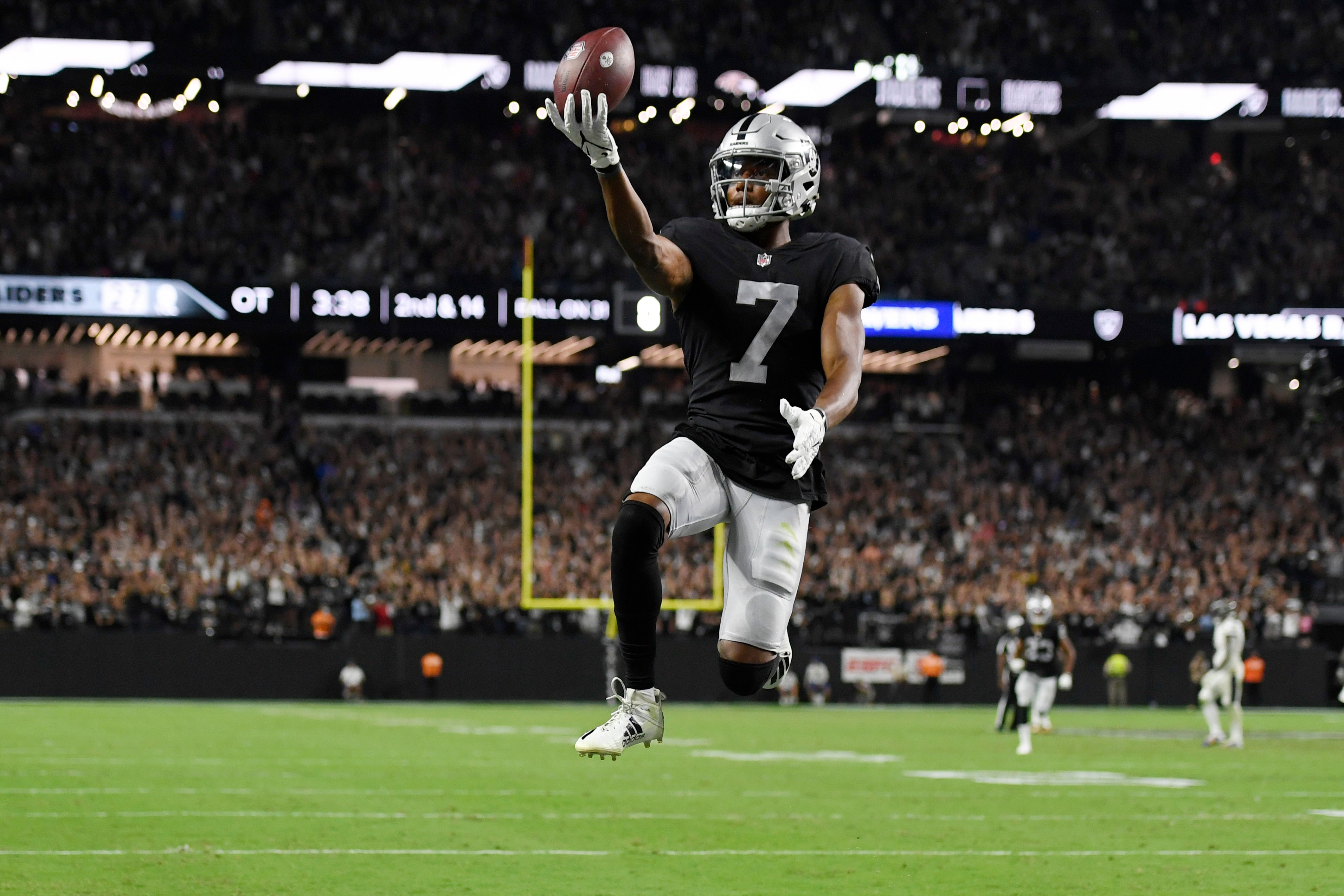 Las Vegas Raiders wide receiver Zay Jones celebrates after scoring the game-winning touchdown against the Baltimore Ravens (David Becker/AP)