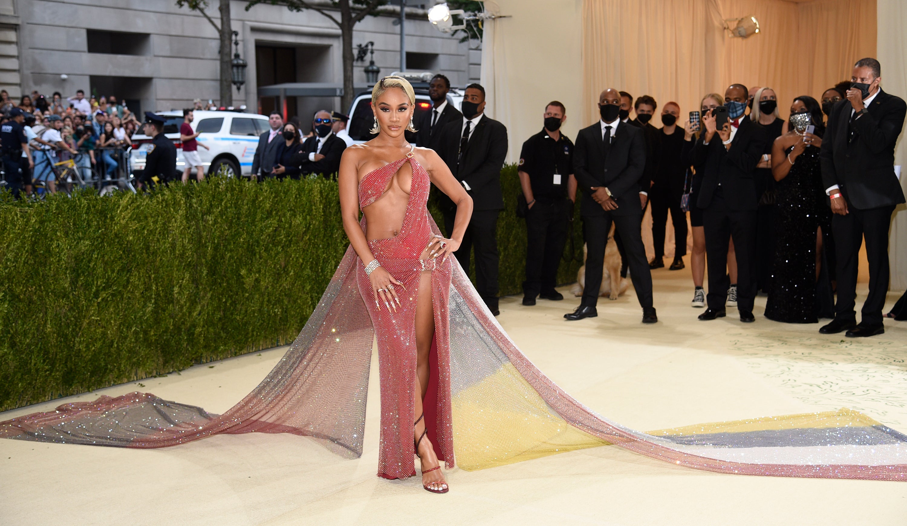Saweetie wore a Valentino dress split up the thigh (Evan Agostini/Invision/AP)