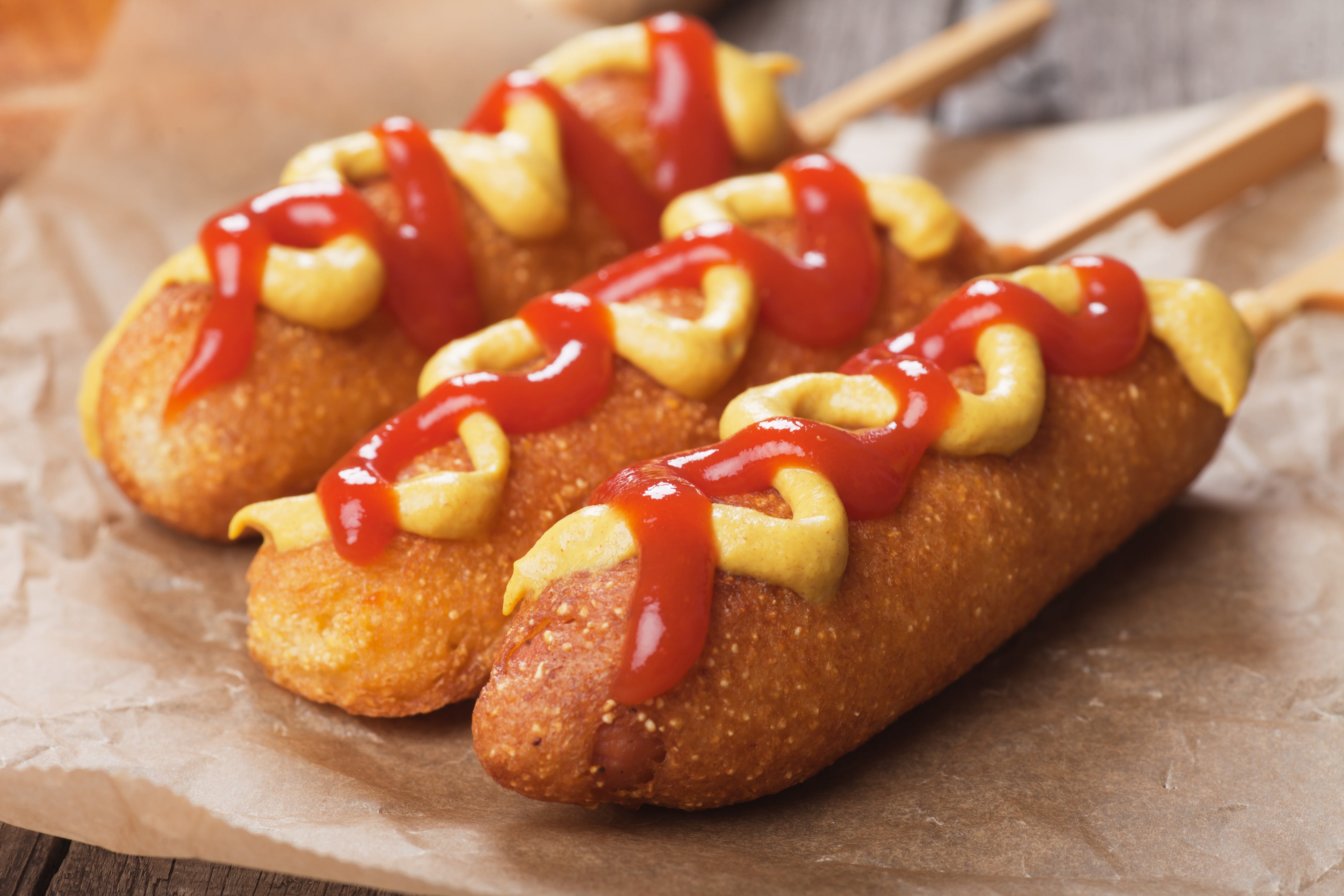 Imagine a hotdog on a stick with a thick layer of deep-fried cornmeal
