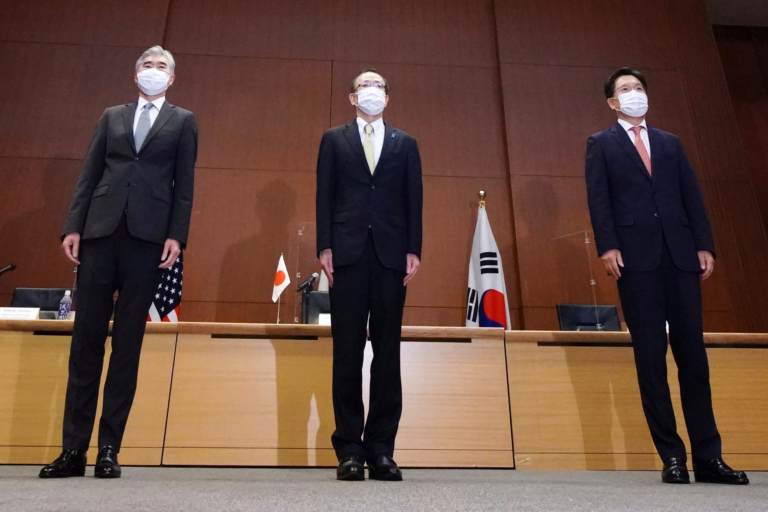 Top Japan, centre, US, left and South Korea’s, right, diplomat hold talks in Tokyo
