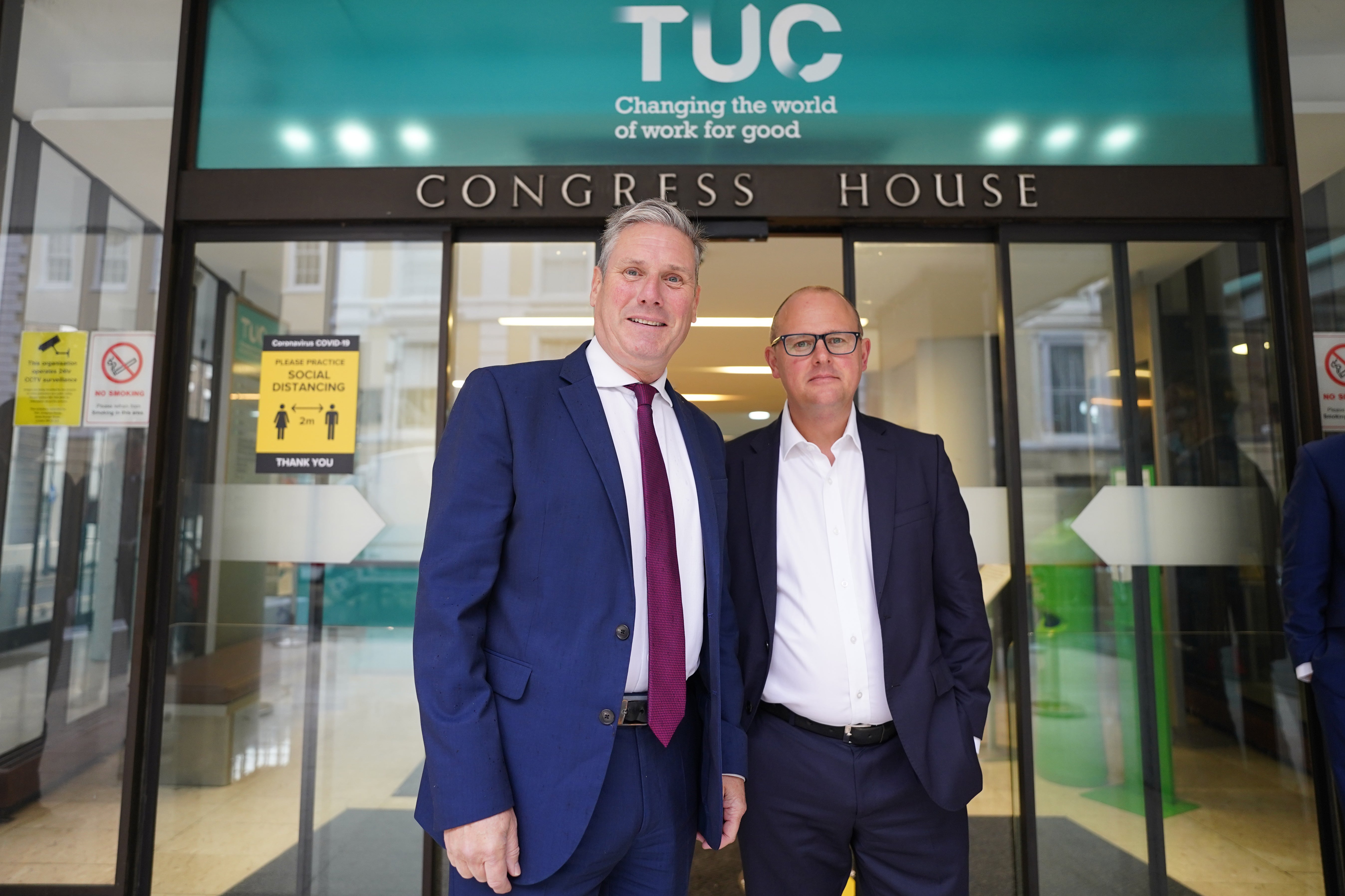 <p>Labour leader Sir Keir Starmer arrives at the TUC congress in London greeted by TUC Deputy General Secretary Paul Nowak</p>