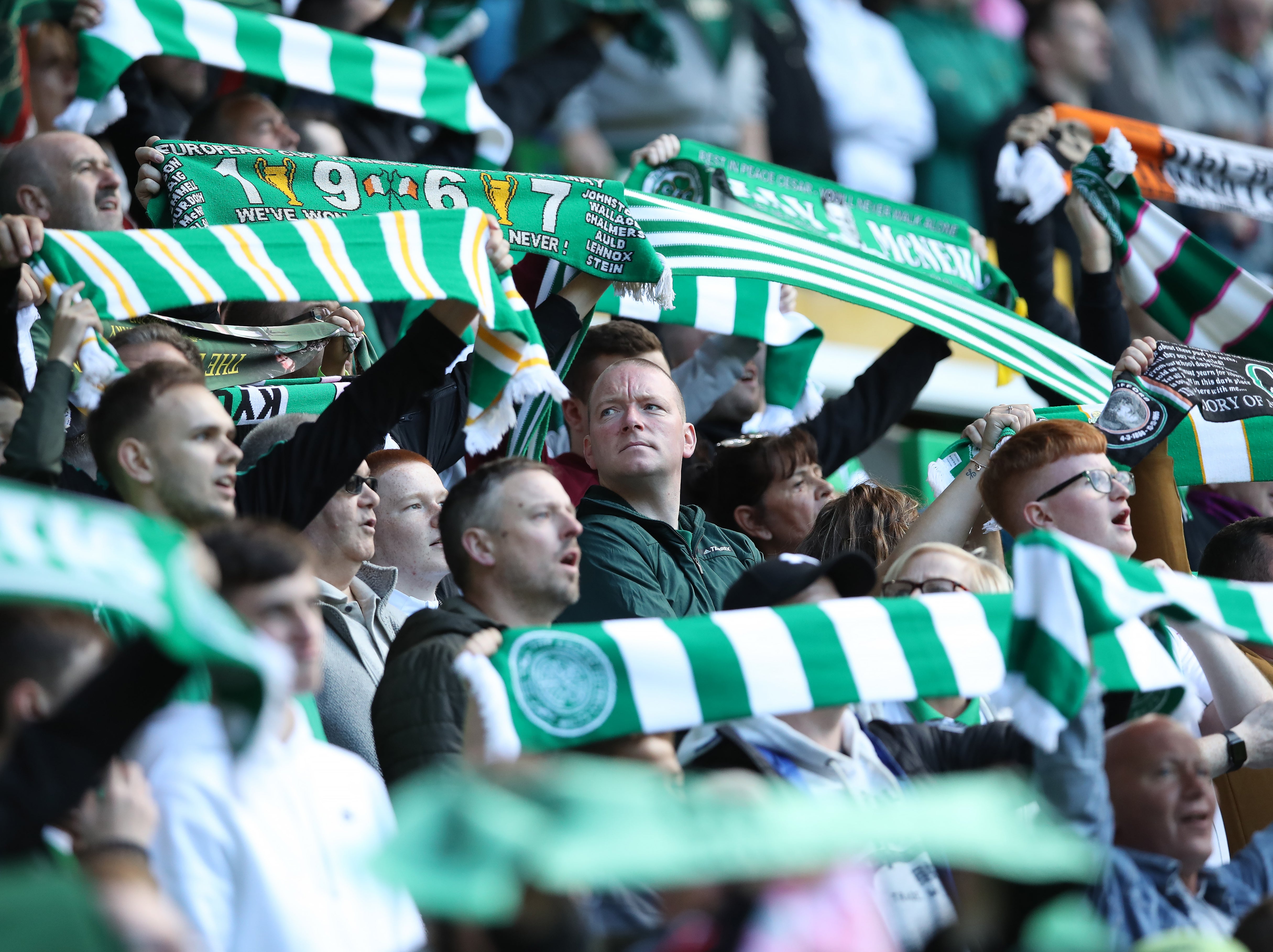 Celtic fans watch on in support of their team