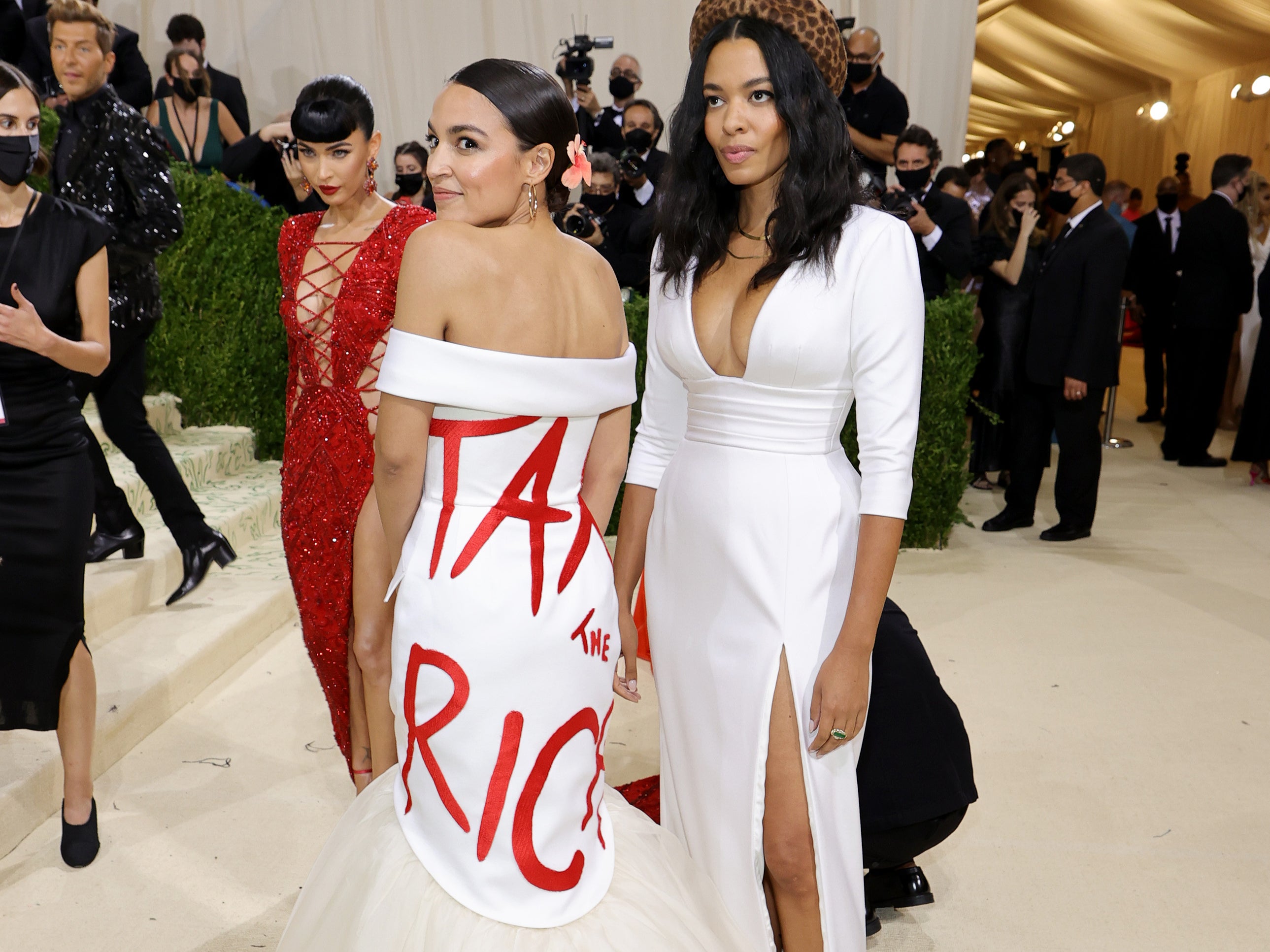 Alexandria Ocasio-Cortez and Aurora James attend The 2021 Met Gala Celebrating In America: A Lexicon Of Fashion at Metropolitan Museum of Art on September 13, 2021 in New York City
