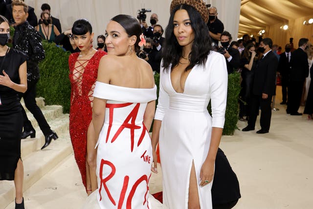 <p>Alexandria Ocasio-Cortez and Aurora James attend The 2021 Met Gala Celebrating In America: A Lexicon Of Fashion at Metropolitan Museum of Art on September 13, 2021 in New York City</p>