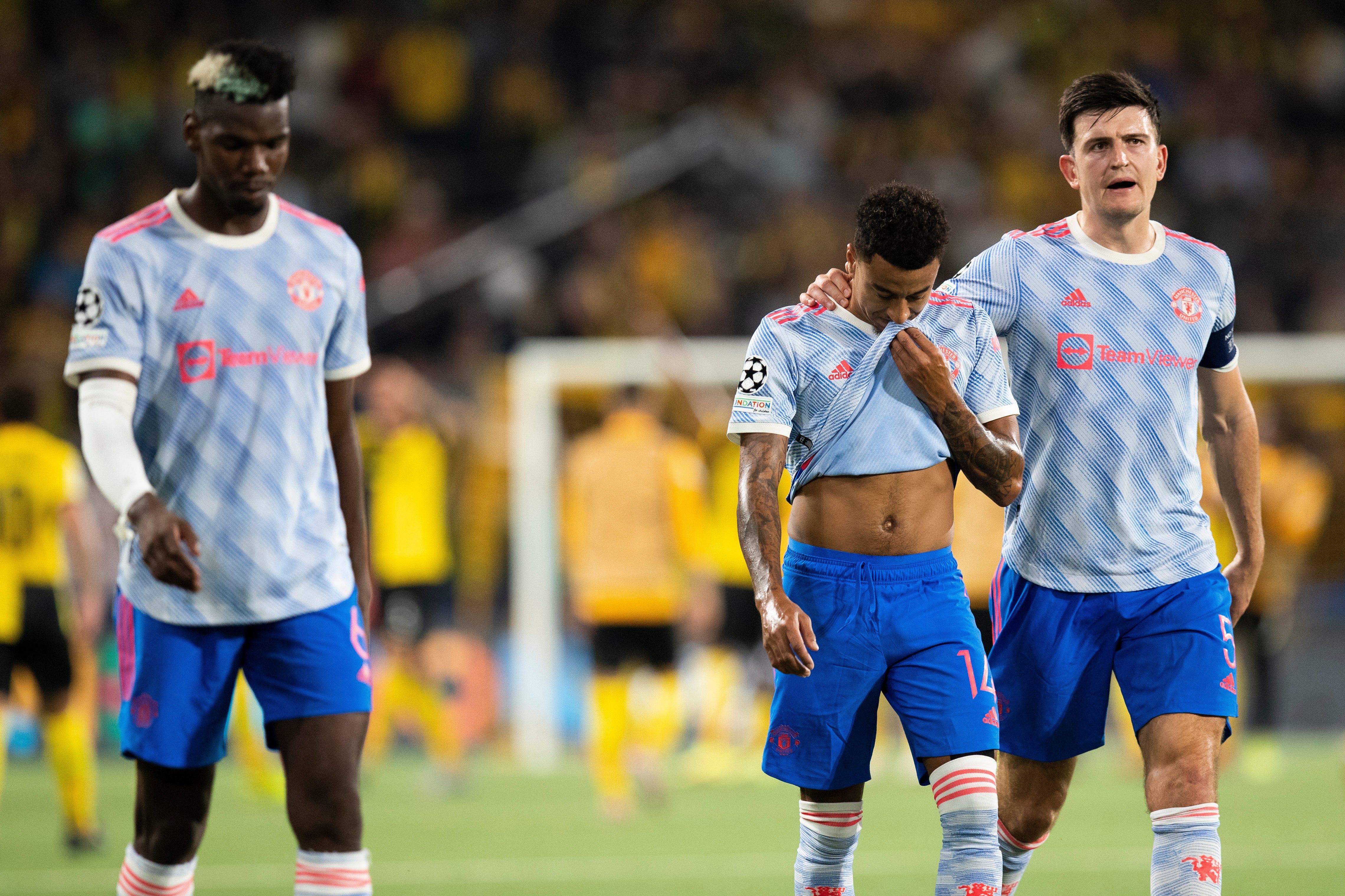 Paul Pogba, Jesse Lingard and Harry Maguire left the field disappointed at full-time (Peter Klaunzer/AP)