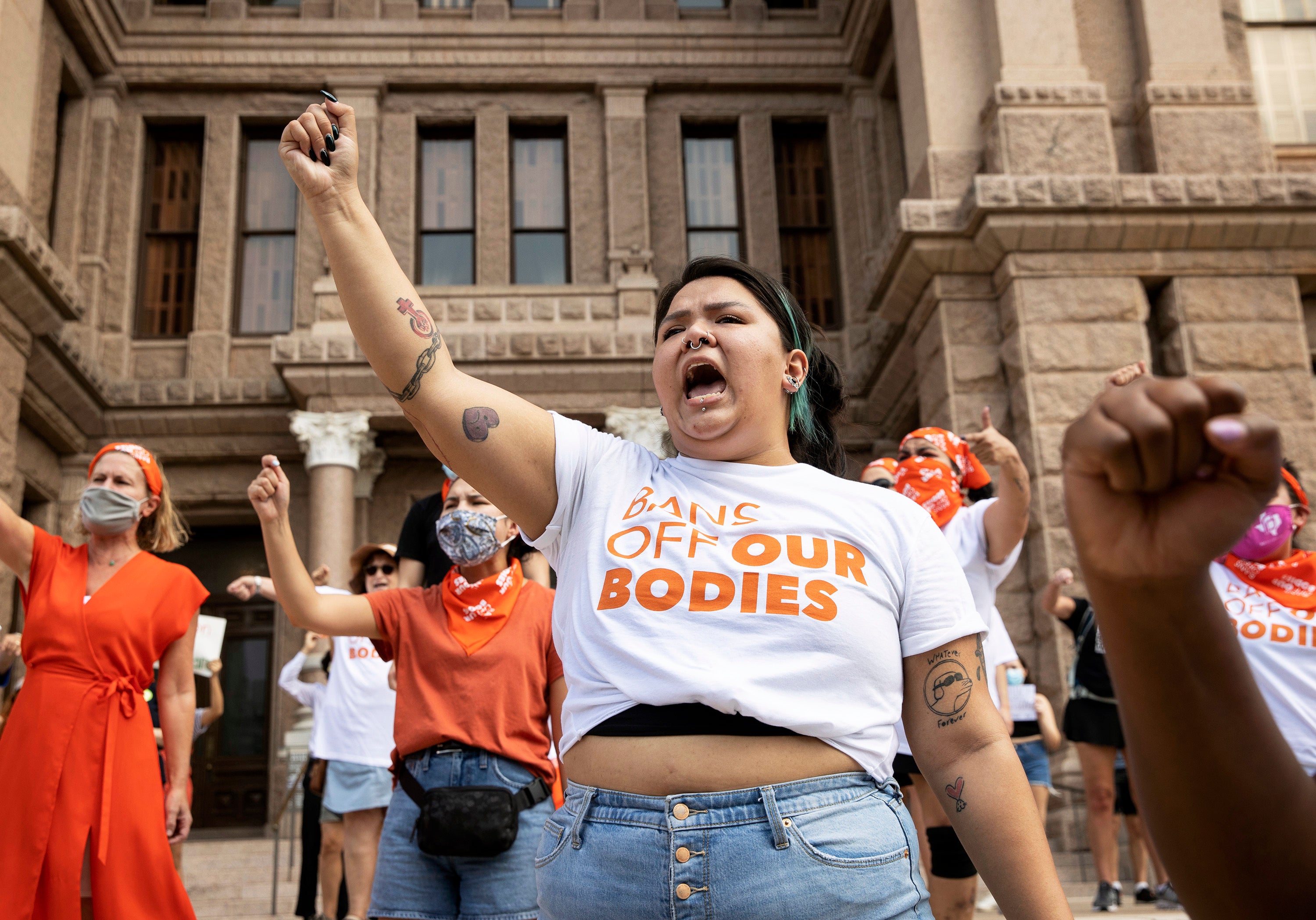 Leen Garza participates in a protest with others against the six-week abortion ban at the Capitol in Austin, Texas
