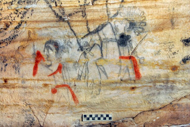 <p>This undated photo provided by Alan Cressler shows a Missouri cave featuring artwork from the Osage Nation more than 1,000 years old </p>