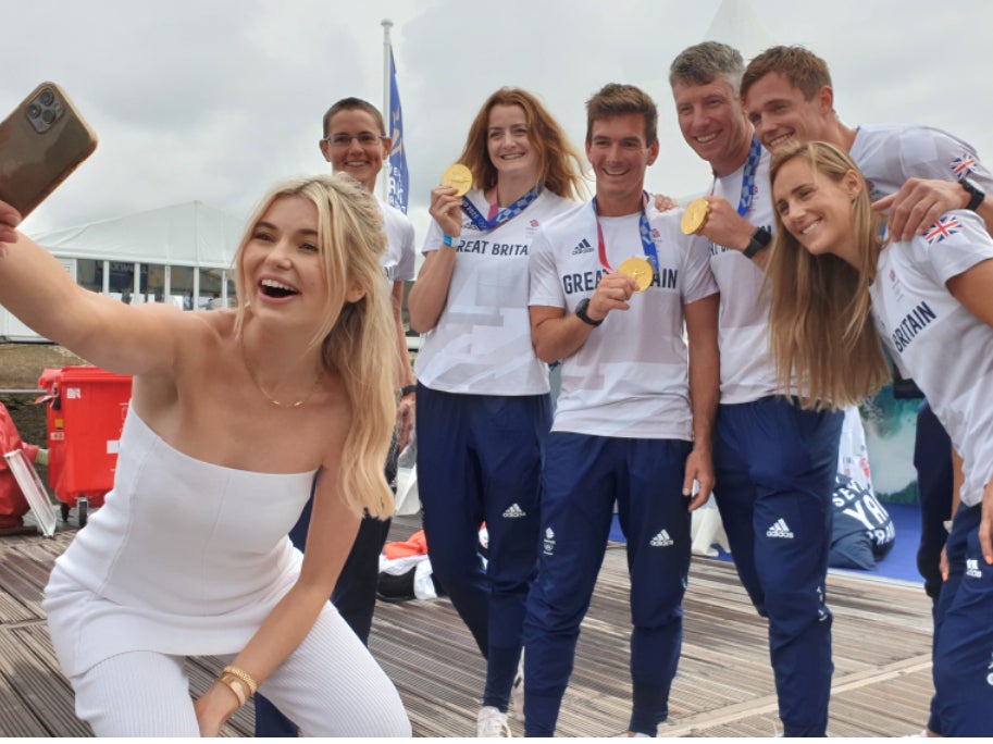 Former Queen of the Jungle Georgia Toffolo takes a selfie with Team GB athletes at Southampton International Boat Show