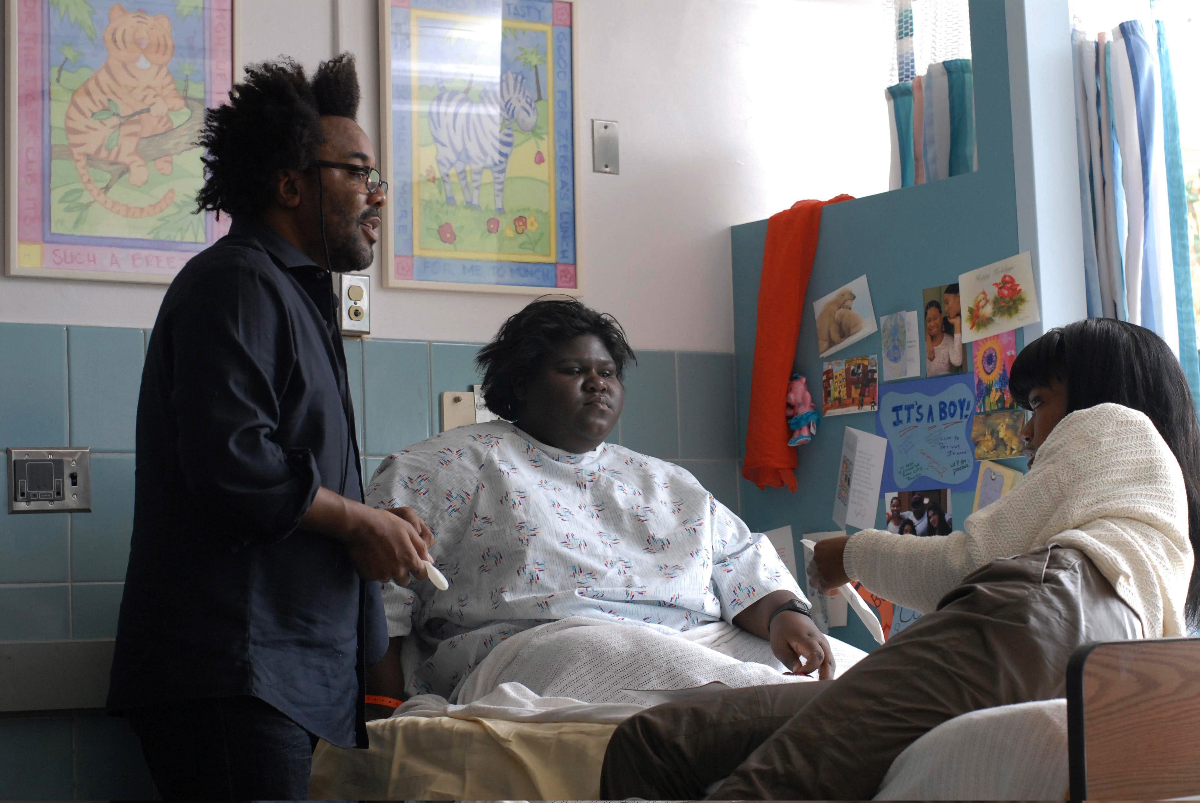 Lee Daniels, Gabourey Gabby Sidibe, Xosha Roquemore on the set of ‘Precious’