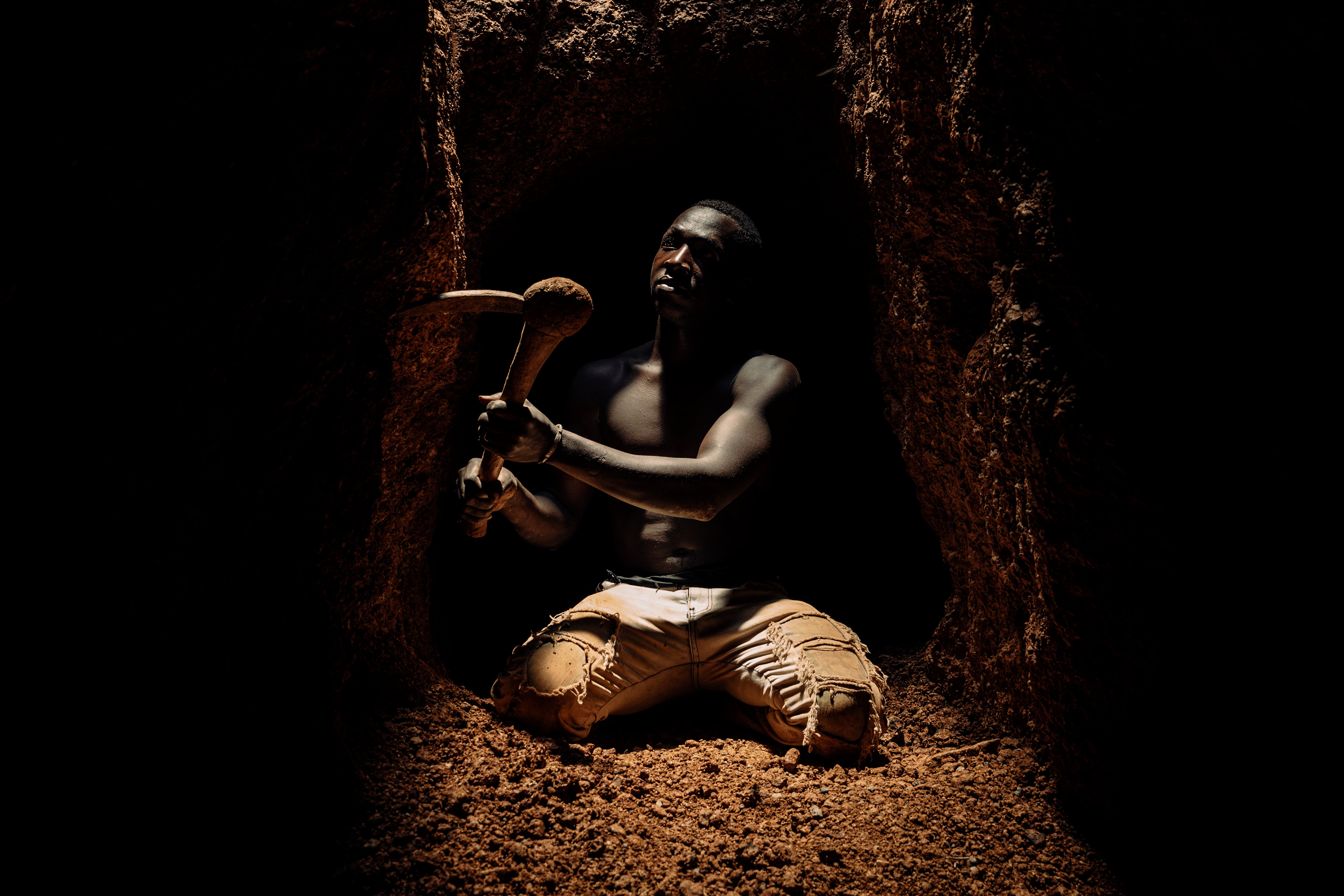 A miner working at a mining town near the Guinea border in Mali