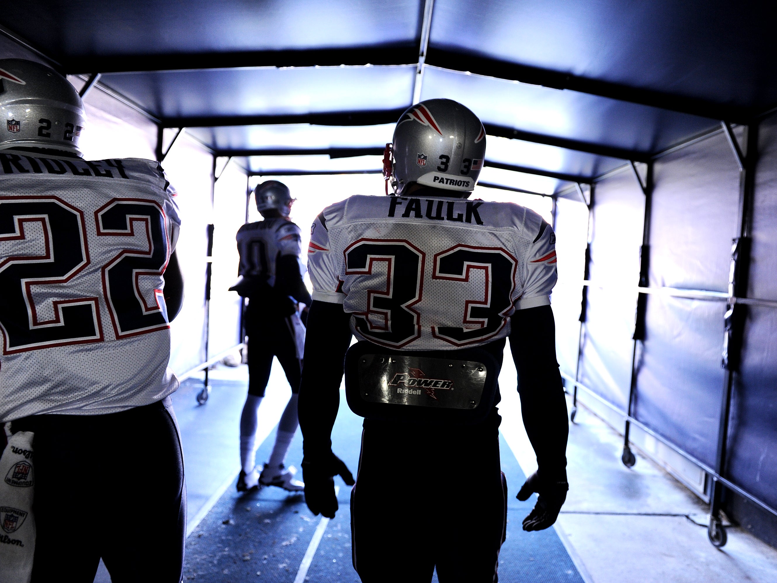 <p>Kevin Faulk of the New England Patriots takes the field during warm ups before taking on the Denver Broncos on December 18, 2011 in Denver, Colorado</p>