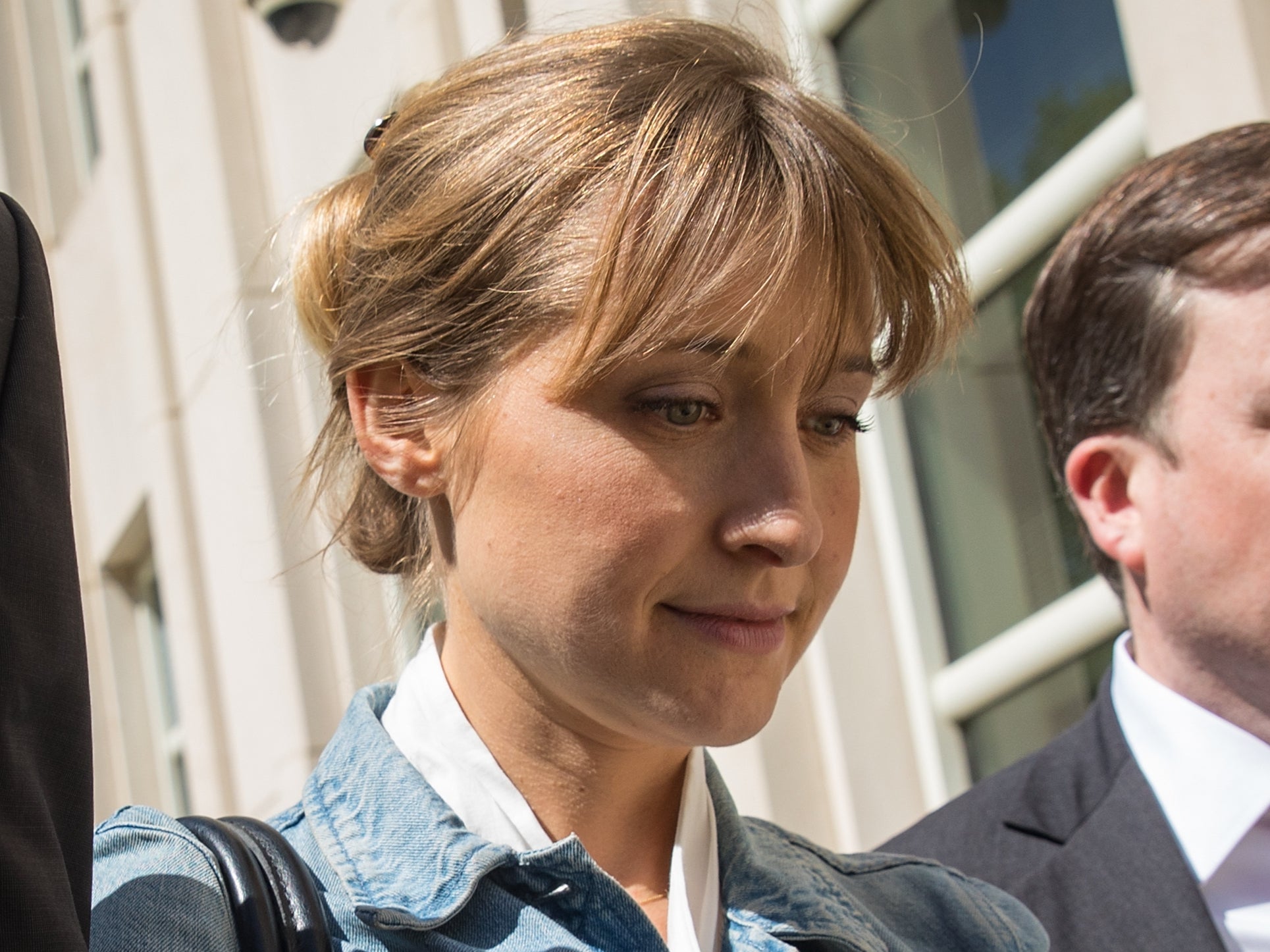 <p>Allison Mack exits the US District Court for the Eastern District of New York following a status conference on 12 June 2018 in Brooklyn</p>