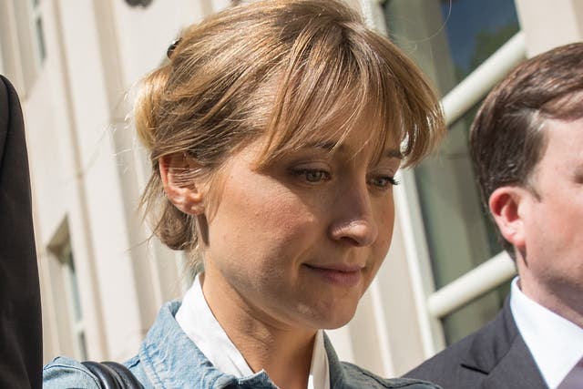 <p>Allison Mack exits the US District Court for the Eastern District of New York following a status conference on 12 June 2018 in Brooklyn</p>