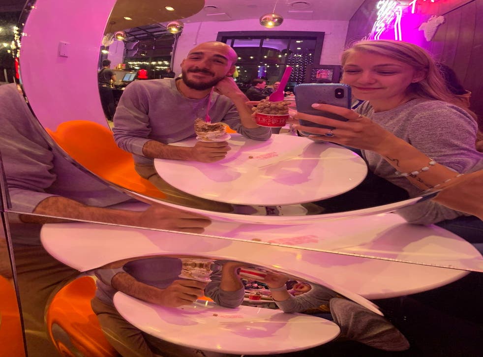 pGabby Petito poses with boyfriend Brian Laundrie at an ice cream parlour. /p