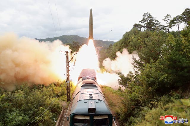 <p>A missile is seen launched during a drill of the Railway Mobile Missile Regiment in North Korea</p>
