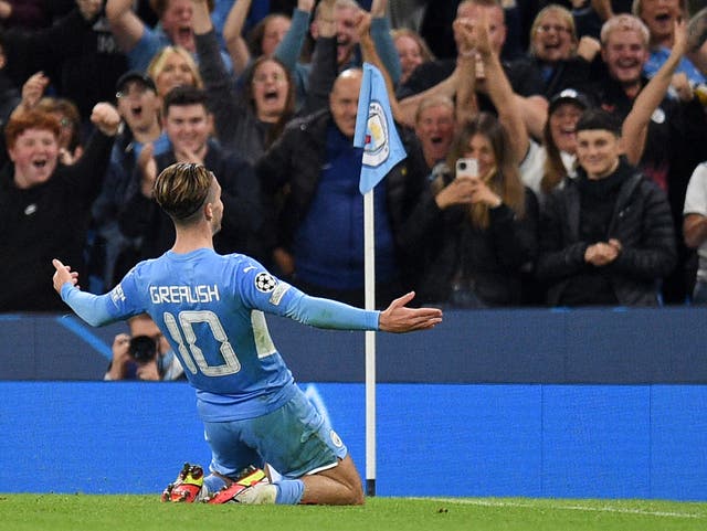 <p>Manchester City’s Jack Grealish celebrates scoring against RB Leipzig</p>