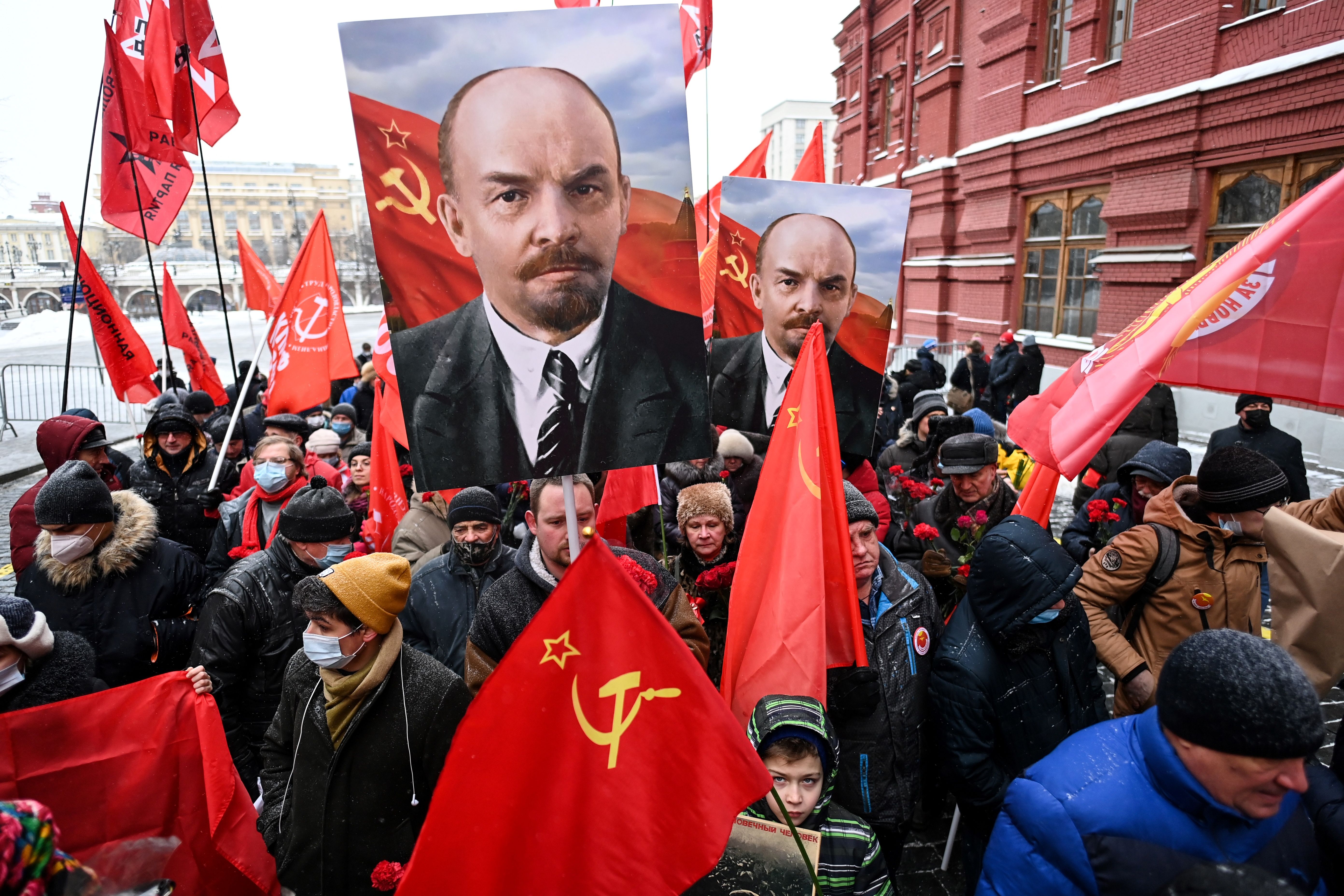 Russian Communist Party supporters walk towards the mausoleum of Lenin in January