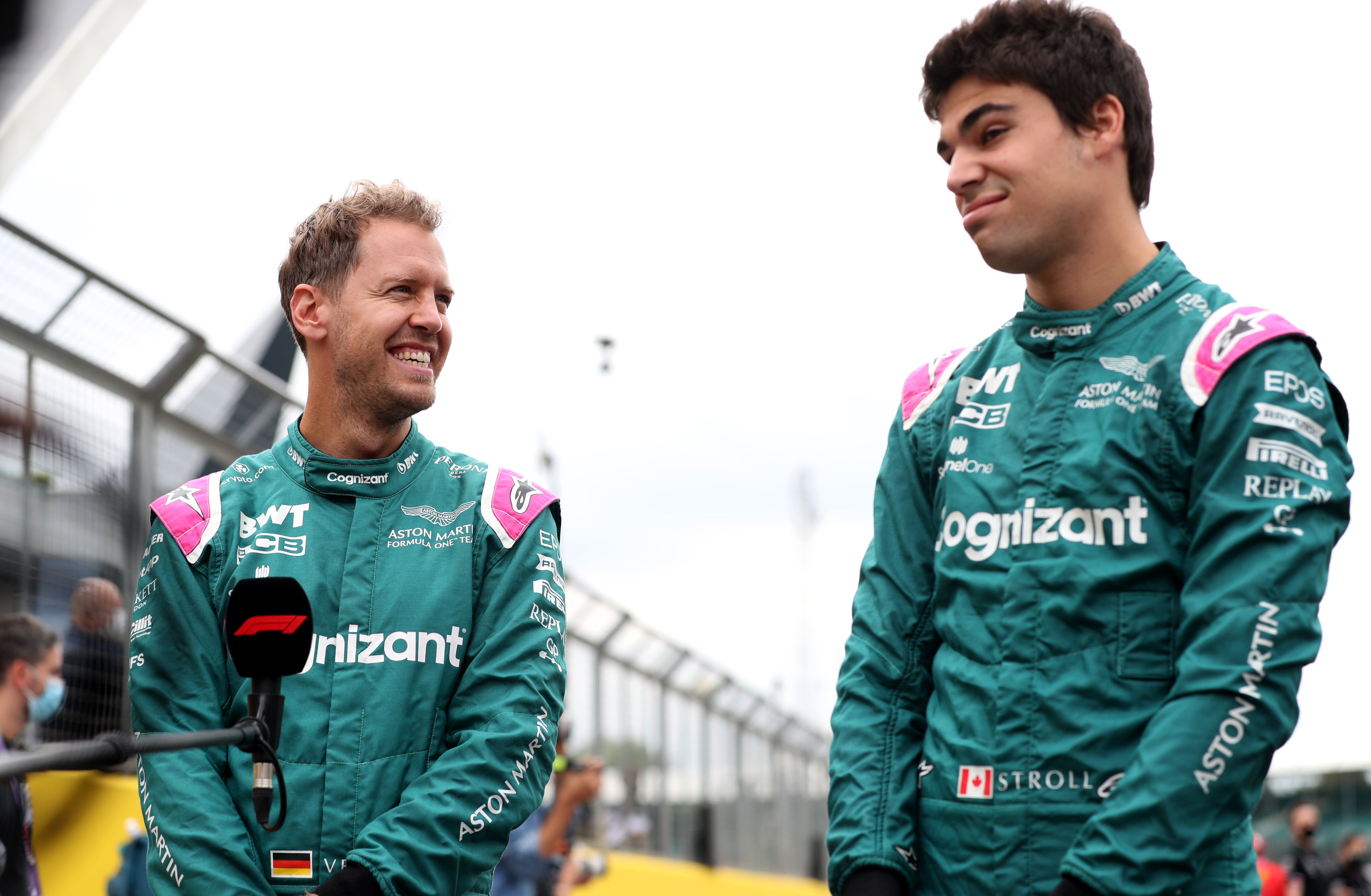 Aston Martin’s Sebastian Vettel (left) and Lance Stroll will continue to race for the team in 2022 (Bradley Collyer/PA)