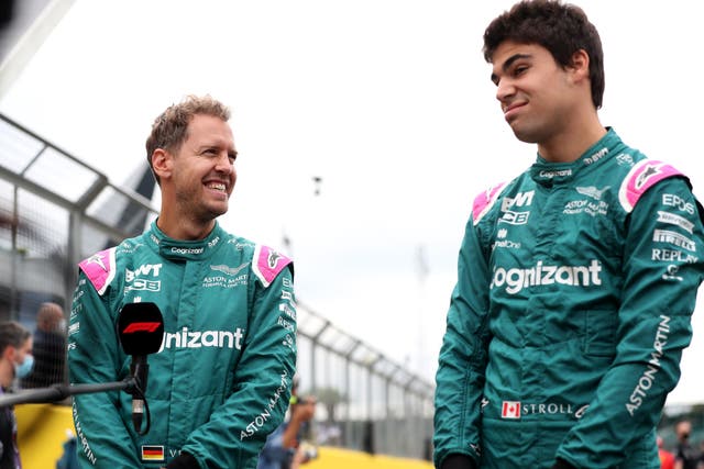 Aston Martin’s Sebastian Vettel (left) and Lance Stroll will continue to race for the team in 2022 (Bradley Collyer/PA)