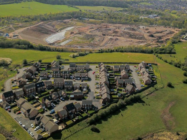 <p>Aerial view of Walleys Quarry landfill beside the town of Silverdale, Newcastle-under-Lyme </p>