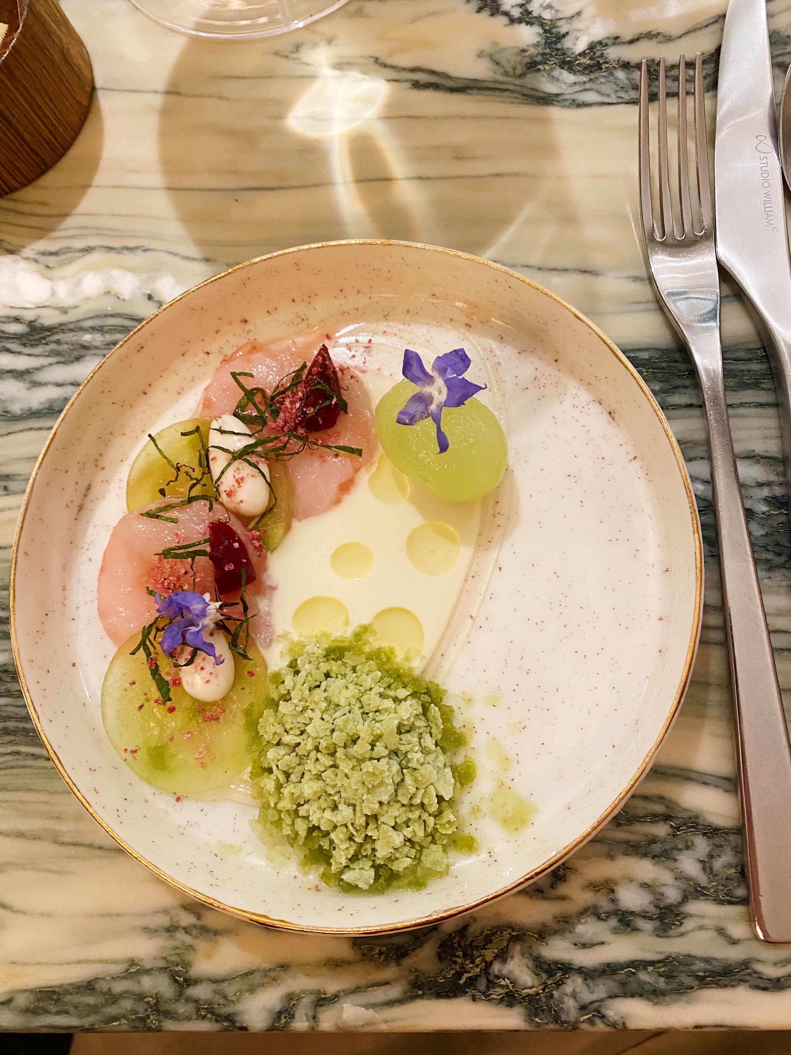 Scallops cured in cherry blossom vinegar, serving as a metaphor for scaling new heights