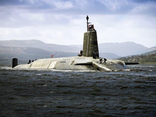 <p>One of the Vanguard Class Ship nuclear submarines in the dock at HM Naval Base Clyde, the home of the UK Submarine Service at Faslane in Argyll and Bute (file photo) </p>