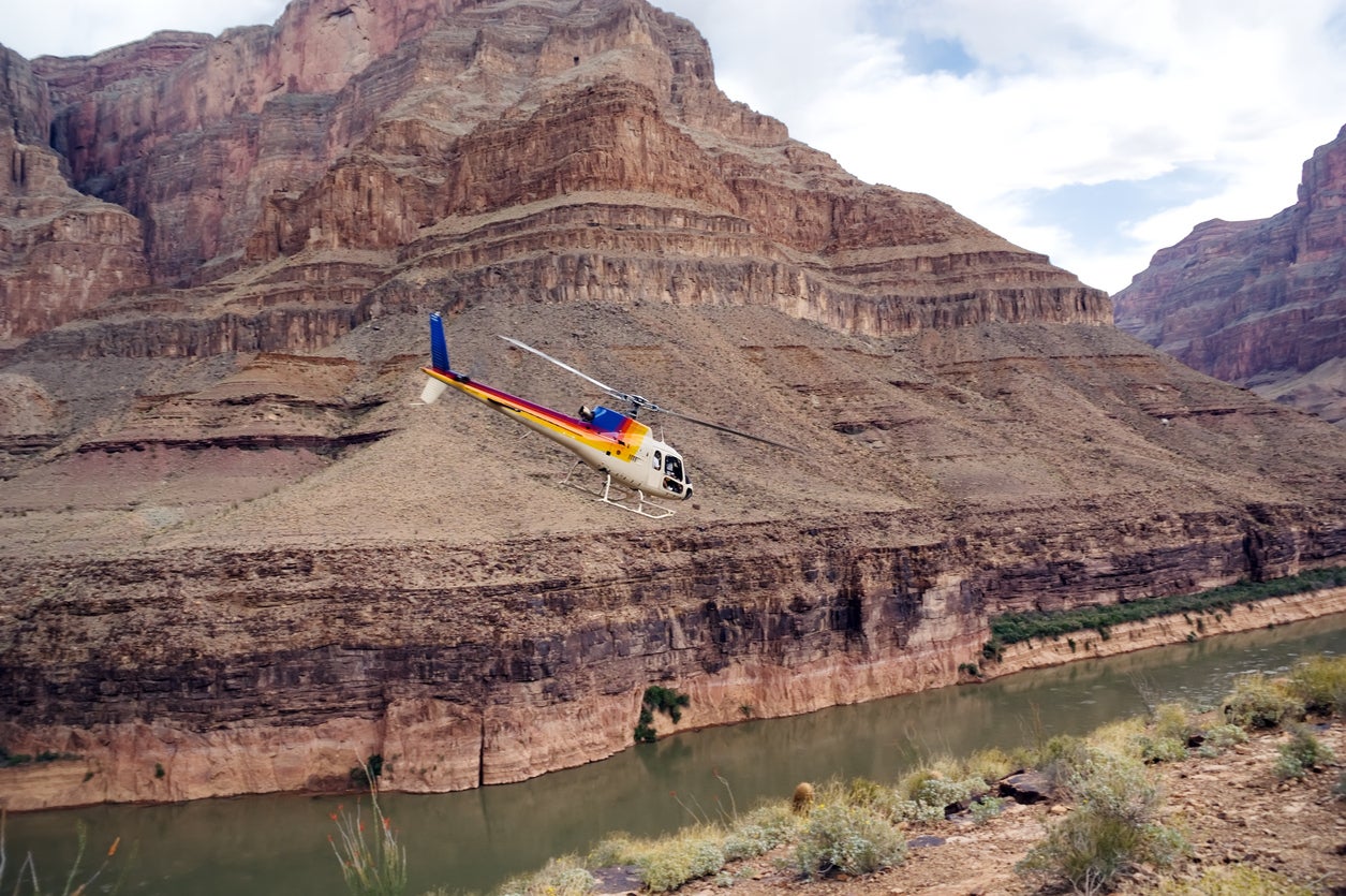 Chopper flying over the Grand Canyon