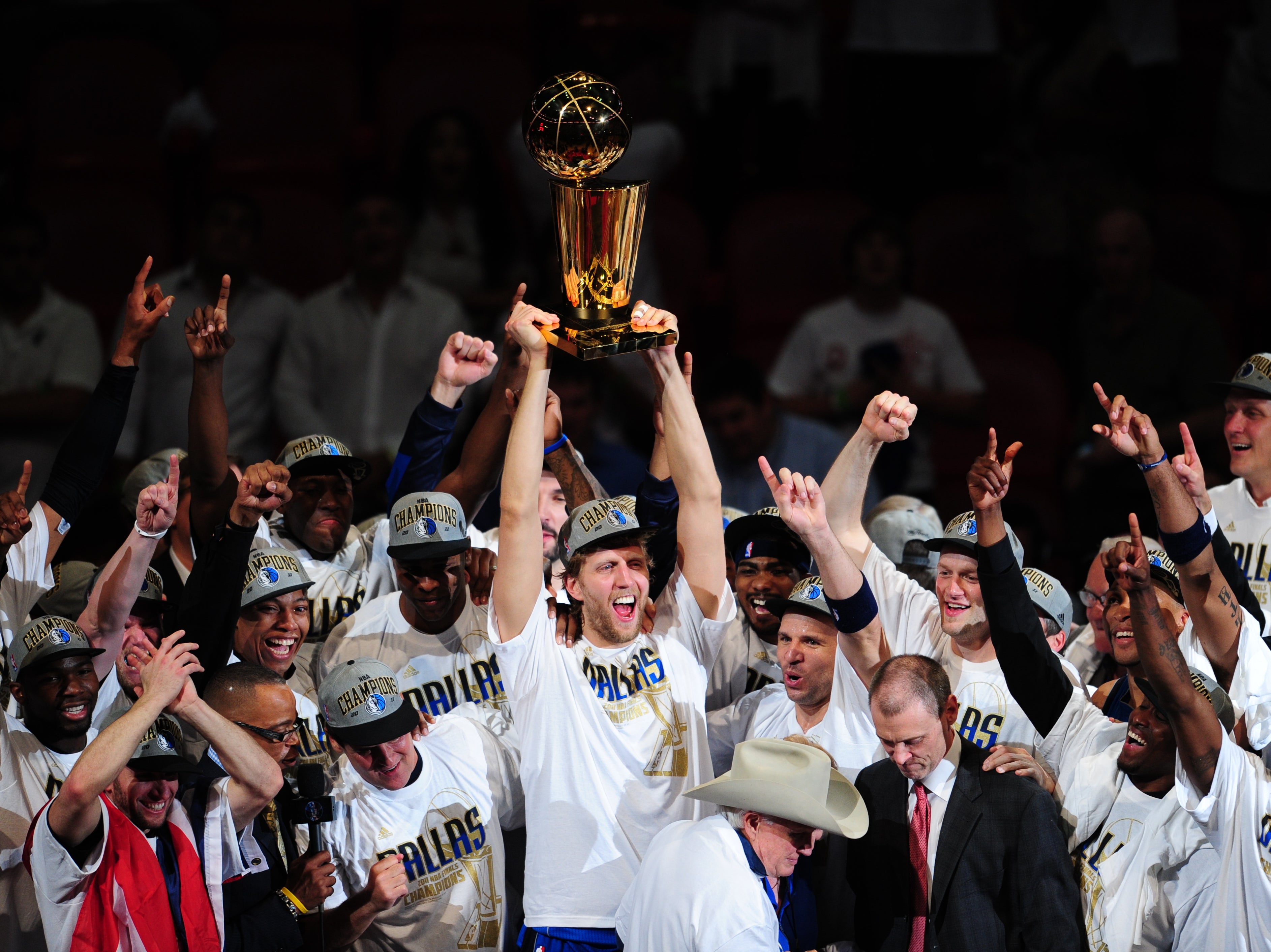 Dirk Nowitzki and his Dallas Mavericks teammates celebrate their 2011 NBA title