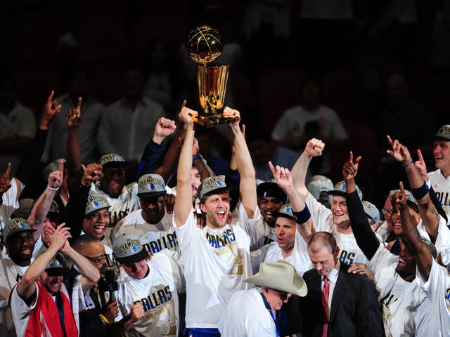 <p>Dirk Nowitzki and his Dallas Mavericks teammates celebrate their 2011 NBA title</p>