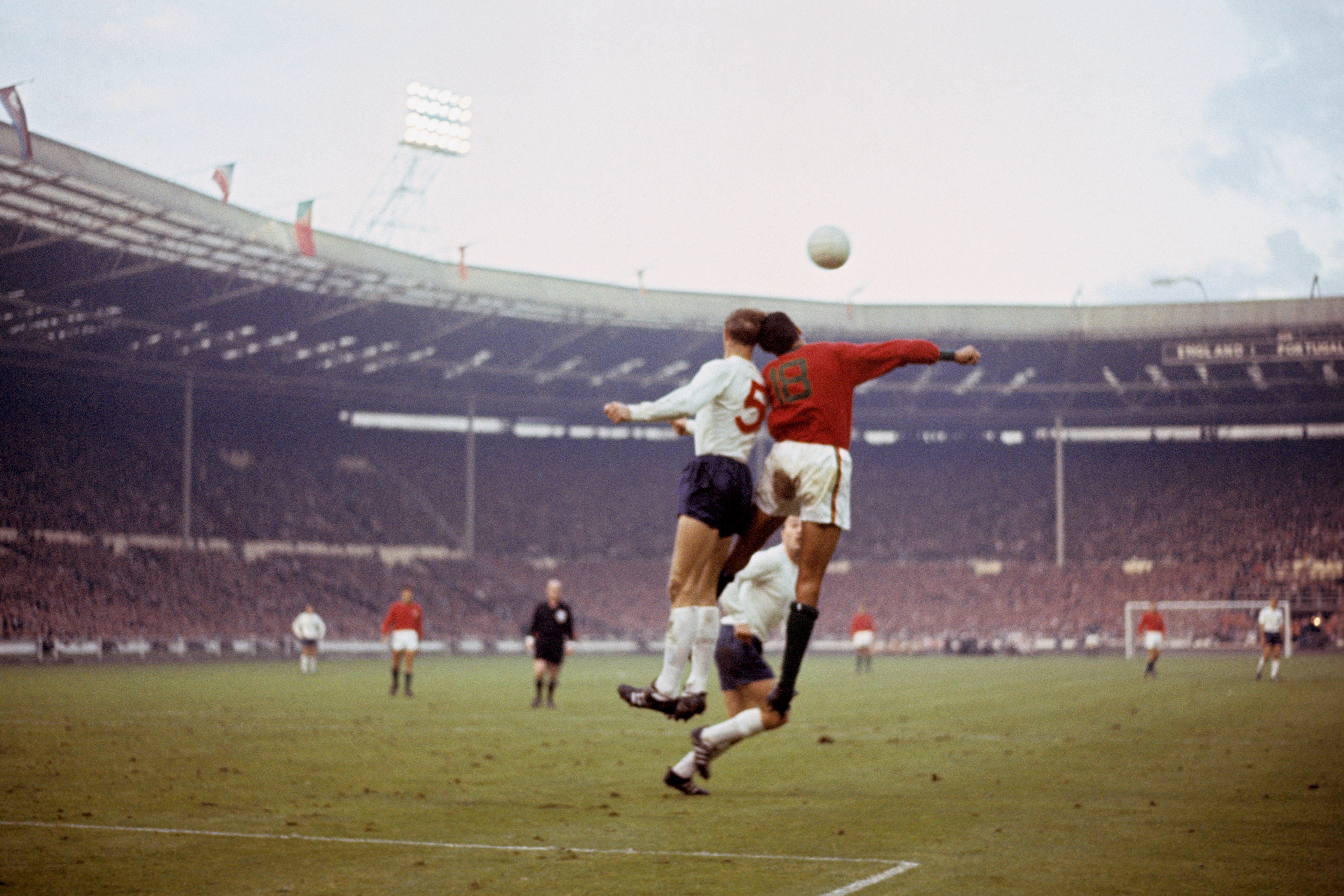 Jack Charlton, who was to develop dementia in later life, heads a ball for England (PA)