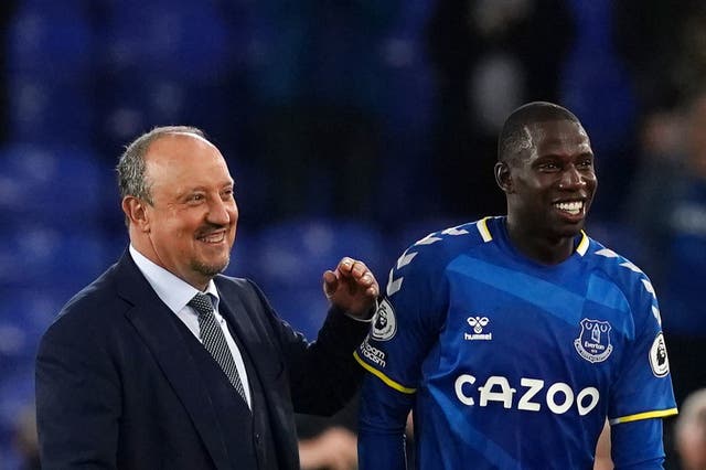 <p>Rafa Benitez and Abdoulaye Doucoure celebrate after Monday’s win over Burnley at Goodison Park</p>