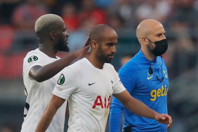 <p>Lucas Moura walk off the pitch after being substituted after sustaining an injury</p>