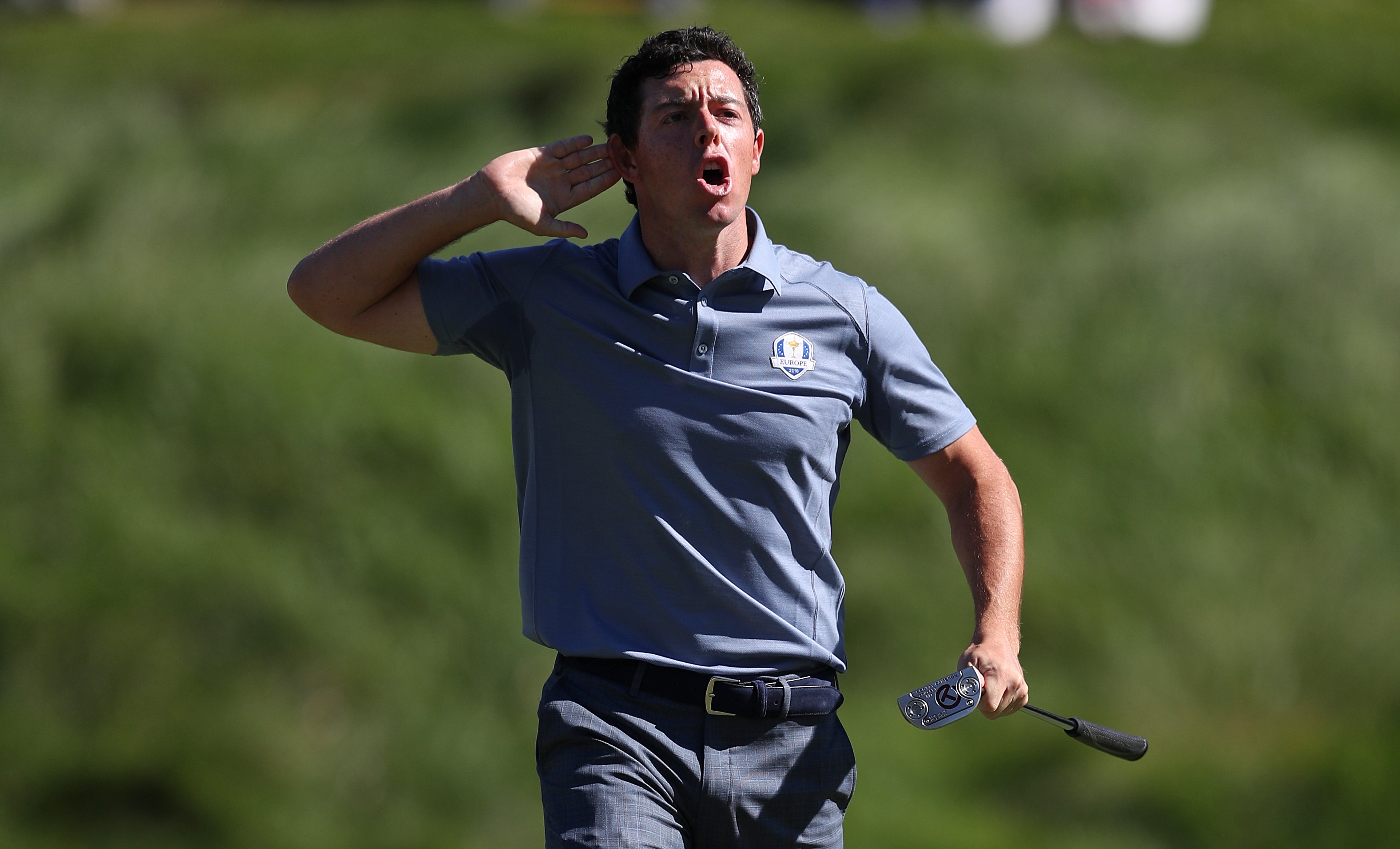 Rory McIlroy celebrates his putt on the eighth hole during his singles defeat to Patrick Reed (David Davies/PA)