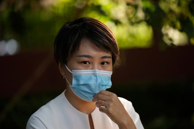 <p>Teresa Xu prepares to attend a court session at the Chaoyang People's Court in Beijing</p>