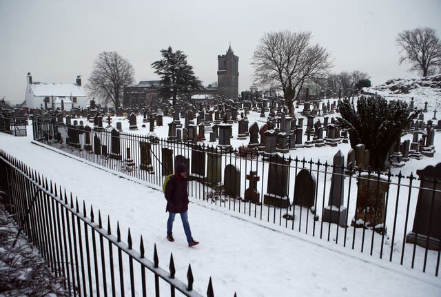 Funeral restrictions were in place for several months during the Covid-19 pandemic (Andrew Milligan/PA)
