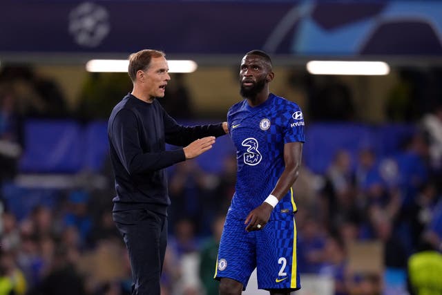 <p>Thomas Tuchel, left, chats with Toni Rudiger, right, after Chelsea’s 1-0 Champions League win over Zenit St Petersburg (John Walton/PA)</p>