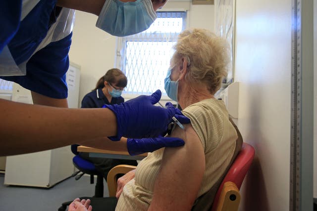 <p>A nurse at a GP practice in Haxby vaccinates an elderly patient </p>